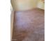 Neutral carpeted bedroom with white trim and a window letting in natural light at 7290 Sheared Cliff Ln # 102, Las Vegas, NV 89149