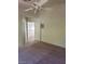 Bedroom with neutral walls, carpet flooring, and a ceiling fan at 7290 Sheared Cliff Ln # 102, Las Vegas, NV 89149