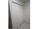 Hallway with tiled floors and a closet with folding doors at 7290 Sheared Cliff Ln # 102, Las Vegas, NV 89149