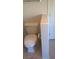 Bathroom toilet with towel holder, white toilet and door at 7290 Sheared Cliff Ln # 102, Las Vegas, NV 89149