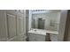 Clean bathroom featuring a vanity with storage and a shower with glass door at 75 N Valle Verde Dr # 2121, Henderson, NV 89074