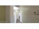 Bright hallway with neutral paint, leading to other areas of the home at 75 N Valle Verde Dr # 2121, Henderson, NV 89074