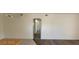 Spacious living room offering flexible design options, featuring neutral walls, and a partial view of hardwood floors at 75 N Valle Verde Dr # 2121, Henderson, NV 89074