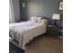 Comfortable bedroom with a plush bed and stylish decor at 7745 Fruit Dove St, North Las Vegas, NV 89084
