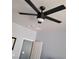 This bedroom features a modern ceiling fan with lights at 7745 Fruit Dove St, North Las Vegas, NV 89084