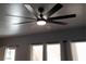 Modern ceiling fan with eight blades and integrated light fixture at 7745 Fruit Dove St, North Las Vegas, NV 89084