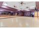 Spacious dance studio featuring wood flooring, mirrors, and ample room for various fitness activities at 7745 Fruit Dove St, North Las Vegas, NV 89084