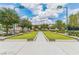 Outdoor lawn bowling area features well-kept greens, manicured surroundings and ample lighting at 7745 Fruit Dove St, North Las Vegas, NV 89084