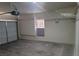 Spacious two-car garage features ample storage space and a window for natural light at 8324 W Charleston Blvd # 2033, Las Vegas, NV 89117