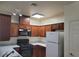 Modern kitchen with white stone countertops, sleek appliances, and ample cabinet space at 8324 W Charleston Blvd # 2033, Las Vegas, NV 89117