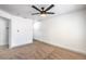 Comfortable bedroom with neutral carpet and ceiling fan at 8469 Sewards Bluff Ave, Las Vegas, NV 89129