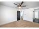 Bedroom with neutral carpet and ceiling fan at 8469 Sewards Bluff Ave, Las Vegas, NV 89129