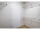 Walk-in closet with wire shelving and carpet flooring at 8469 Sewards Bluff Ave, Las Vegas, NV 89129