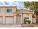 Charming two-story home with tile roof, desert landscaping, and attached one car garage at 8469 Sewards Bluff Ave, Las Vegas, NV 89129