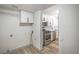 Bright kitchen featuring stainless steel appliances, light wood flooring, and white cabinets at 8469 Sewards Bluff Ave, Las Vegas, NV 89129