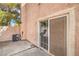 Cozy patio space with sliding glass door access to the home's interior at 8469 Sewards Bluff Ave, Las Vegas, NV 89129