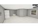 Airy bedroom features a large window and neutral paint at 8809 Barium Rock Ave, Las Vegas, NV 89143