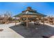 Community gazebo with picnic tables and benches in a well-maintained outdoor space, perfect for gatherings at 8809 Barium Rock Ave, Las Vegas, NV 89143