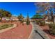 Well-maintained community park with a gazebo, playground, and walking path surrounded by greenery at 8809 Barium Rock Ave, Las Vegas, NV 89143