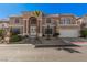 Charming two-story home with a well-manicured landscaped front yard at 8809 Barium Rock Ave, Las Vegas, NV 89143
