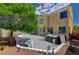 Relaxing backyard features a patio, hot tub, and mature landscaping for outdoor enjoyment at 9012 Old River Ave, Las Vegas, NV 89149