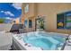 Backyard featuring a hot tub and large patio at 9012 Old River Ave, Las Vegas, NV 89149