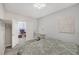 Cozy bedroom with gray walls, closet, neutral tones and decor, and adjoining room at 9012 Old River Ave, Las Vegas, NV 89149