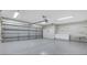 Large clean garage with a gray epoxy floor at 9012 Old River Ave, Las Vegas, NV 89149