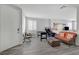 Spacious living area with sleek flooring, neutral colors, and an open layout perfect for entertaining at 9012 Old River Ave, Las Vegas, NV 89149