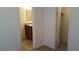 Bright bathroom featuring tile flooring, a modern vanity, and a walk-in closet at 10371 Calypso Cave St, Las Vegas, NV 89141