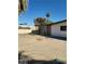 Wide view of the backyard with covered patio and a large space at 1413 Bryn Mawr Ave, Las Vegas, NV 89102