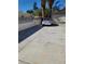 View of driveway leading to detached garage, accommodating parking for multiple vehicles at 1413 Bryn Mawr Ave, Las Vegas, NV 89102