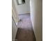 Hallway with neutral carpet leading to a bathroom with tiled flooring at 1413 Bryn Mawr Ave, Las Vegas, NV 89102