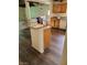 Cozy kitchen bar blending into the living area, enhanced by modern wood floors and convenient access at 1413 Bryn Mawr Ave, Las Vegas, NV 89102