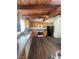 Well-lit kitchen boasting wooden cabinets, modern appliances, and practical wood floors at 1413 Bryn Mawr Ave, Las Vegas, NV 89102
