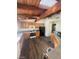 Charming kitchen featuring wooden cabinets, modern appliances, and durable wood floors at 1413 Bryn Mawr Ave, Las Vegas, NV 89102