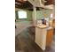 View of the kitchen bar, seamlessly connecting to the living area, featuring wood floors and a welcoming atmosphere at 1413 Bryn Mawr Ave, Las Vegas, NV 89102