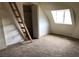 Bedroom with a window, ladder and carpet at 1427 San Felipe Dr, Boulder City, NV 89005