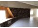 Cozy living room with an interesting architectural feature, natural stone, and a window seat at 1427 San Felipe Dr, Boulder City, NV 89005