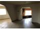 Living room with tile flooring and an adjacent architectural feature showcasing a bright window at 1427 San Felipe Dr, Boulder City, NV 89005