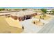 An impressive single story stucco home featuring a circular driveway and desert landscaping at 1440 Lost Creek Dr, Pahrump, NV 89048