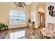 Foyer with elegant marble floors, arched windows offering great natural light at 1440 Lost Creek Dr, Pahrump, NV 89048
