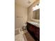 Bathroom featuring a granite vanity and tile floors at 16 Via Visione # 102, Henderson, NV 89011