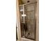Tiled shower with a sliding glass door at 16 Via Visione # 102, Henderson, NV 89011