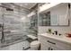 Beautiful bathroom showcasing a walk-in shower with unique tile and modern fixtures at 1859 Woodhaven Dr, Henderson, NV 89074