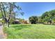 Expansive community park with playground, picnic area, and lush green space at 1859 Woodhaven Dr, Henderson, NV 89074