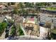 Community tennis court with covered seating area, perfect for enjoying a match with friends at 1859 Woodhaven Dr, Henderson, NV 89074
