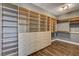 Spacious walk-in closet with custom shelving and drawers, providing ample storage space at 1859 Woodhaven Dr, Henderson, NV 89074