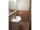 Bathroom featuring a vanity with a sink, a mirror, and a shower at 1936 St Lawrence Dr, Las Vegas, NV 89108