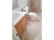 Bathroom featuring tiled walk-in shower, toilet and sink at 1936 St Lawrence Dr, Las Vegas, NV 89108